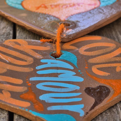 Porte-bonheur - Double cœur marron orange